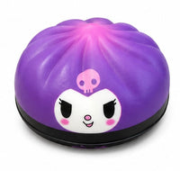 Orange glitter jack-o-lantern Squish Pop squishy toy with holographic sparkle